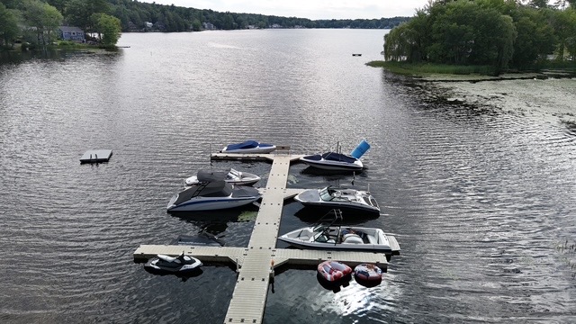 A group dock on Sunset Lake (Wash Pond) in Hampstead New Hampshire
